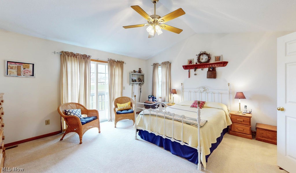 10147 Page Road Streetsboro, OH 44241 - Photo 19 of 35 Carpeted bedroom featuring vaulted ceiling and ceiling fan