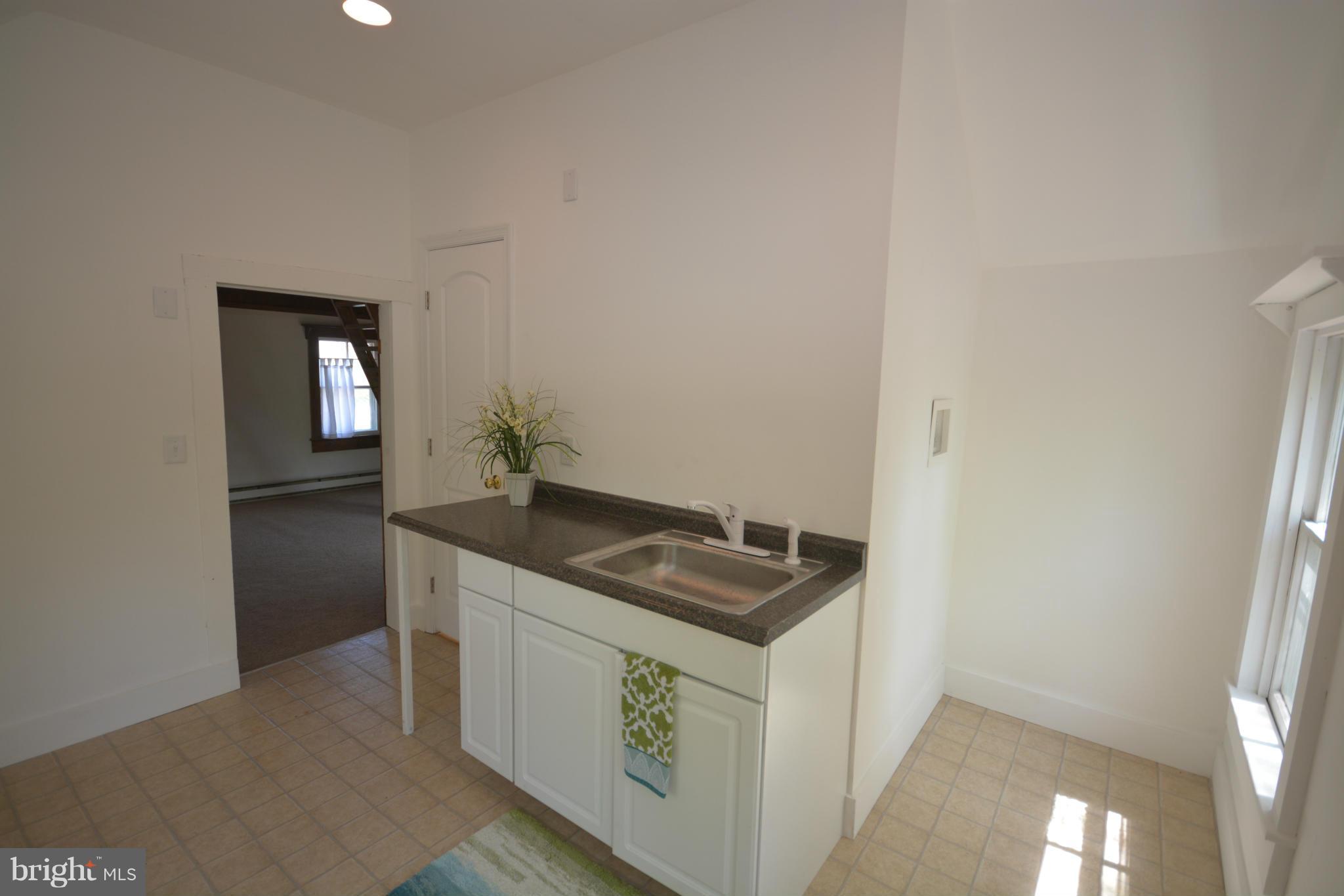 7414 Back Street Newcomb, MD 21653 - Photo 11 of 14 Back corner has laundry hookups.