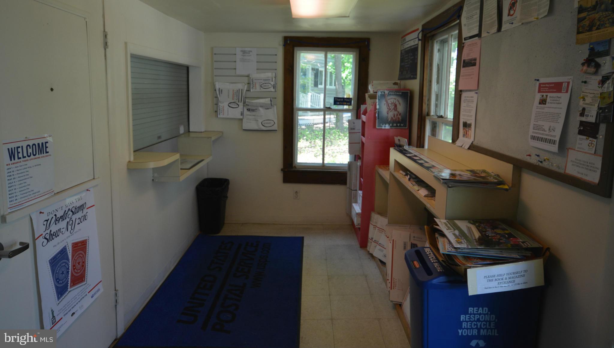 7414 Back Street Newcomb, MD 21653 - Photo 5 of 14 Post Office reception & service window.