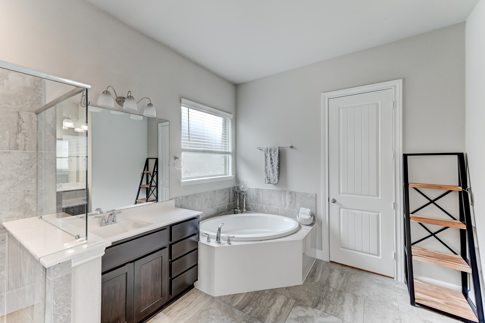5806 Metaphor Way Rosenberg, TX 77469 - Photo 24 of 50 a bathroom with a toilet a sink a mirror and shower