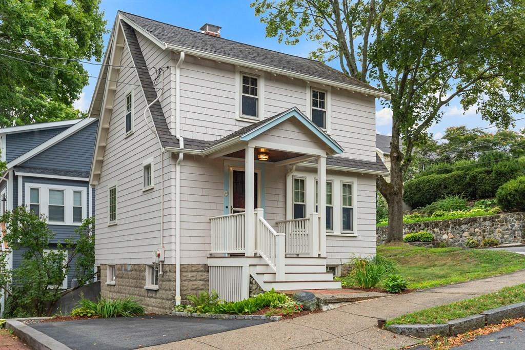 44 Sutherland Road Arlington, MA 02476 - Photo 1 of 21 a front view of a house with a yard
