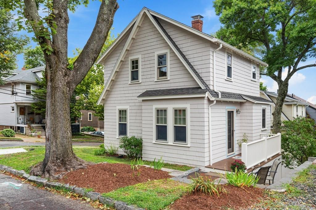 44 Sutherland Road Arlington, MA 02476 - Photo 21 of 21 a front view of a house with garden