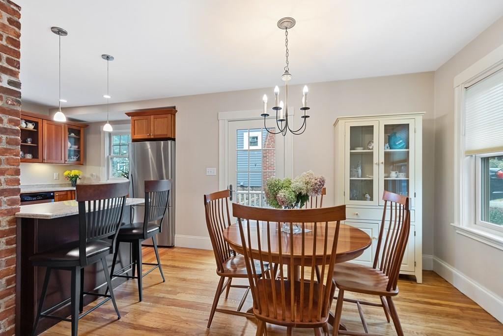 44 Sutherland Road Arlington, MA 02476 - Photo 7 of 21 a view of a dining room with furniture window and wooden floor