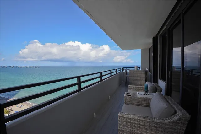 a view of balcony and furniture