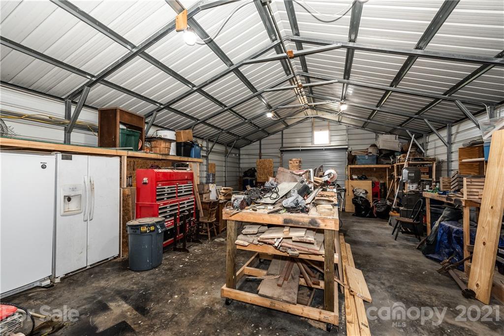 4638 Barrier Road Concord, NC 28025 - Photo 29 of 43 a view of a room with gym equipment