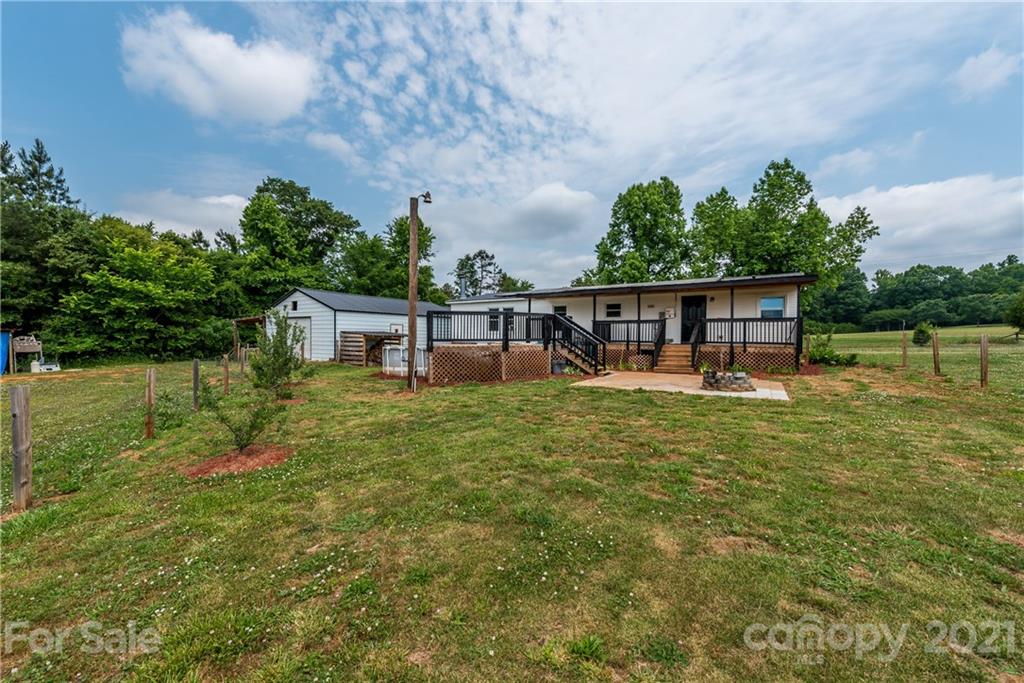 4638 Barrier Road Concord, NC 28025 - Photo 37 of 43 a house view with swimming pool and garden space