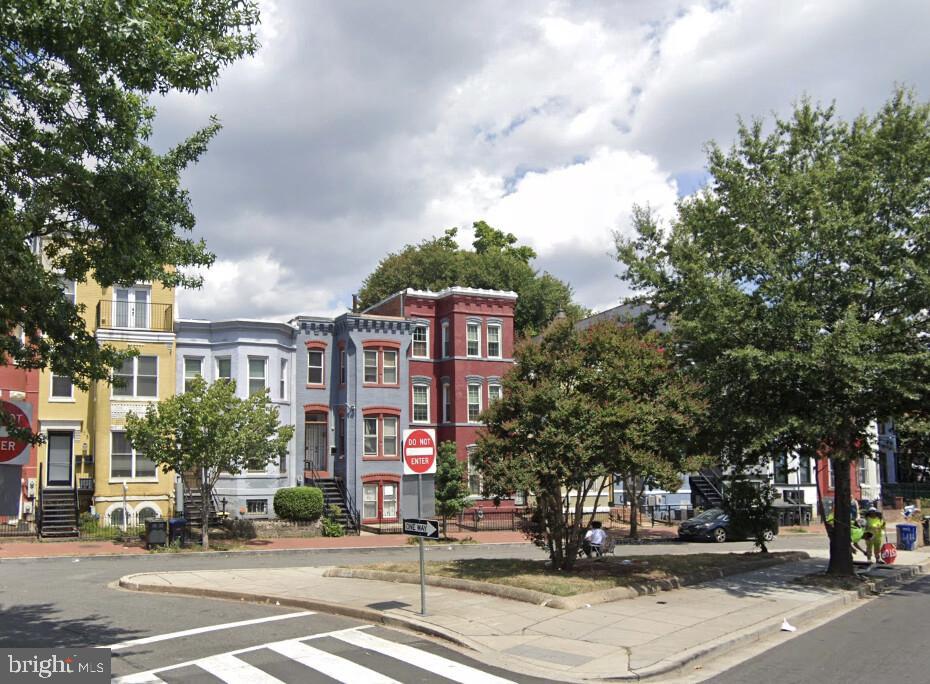 a view of a building and a street