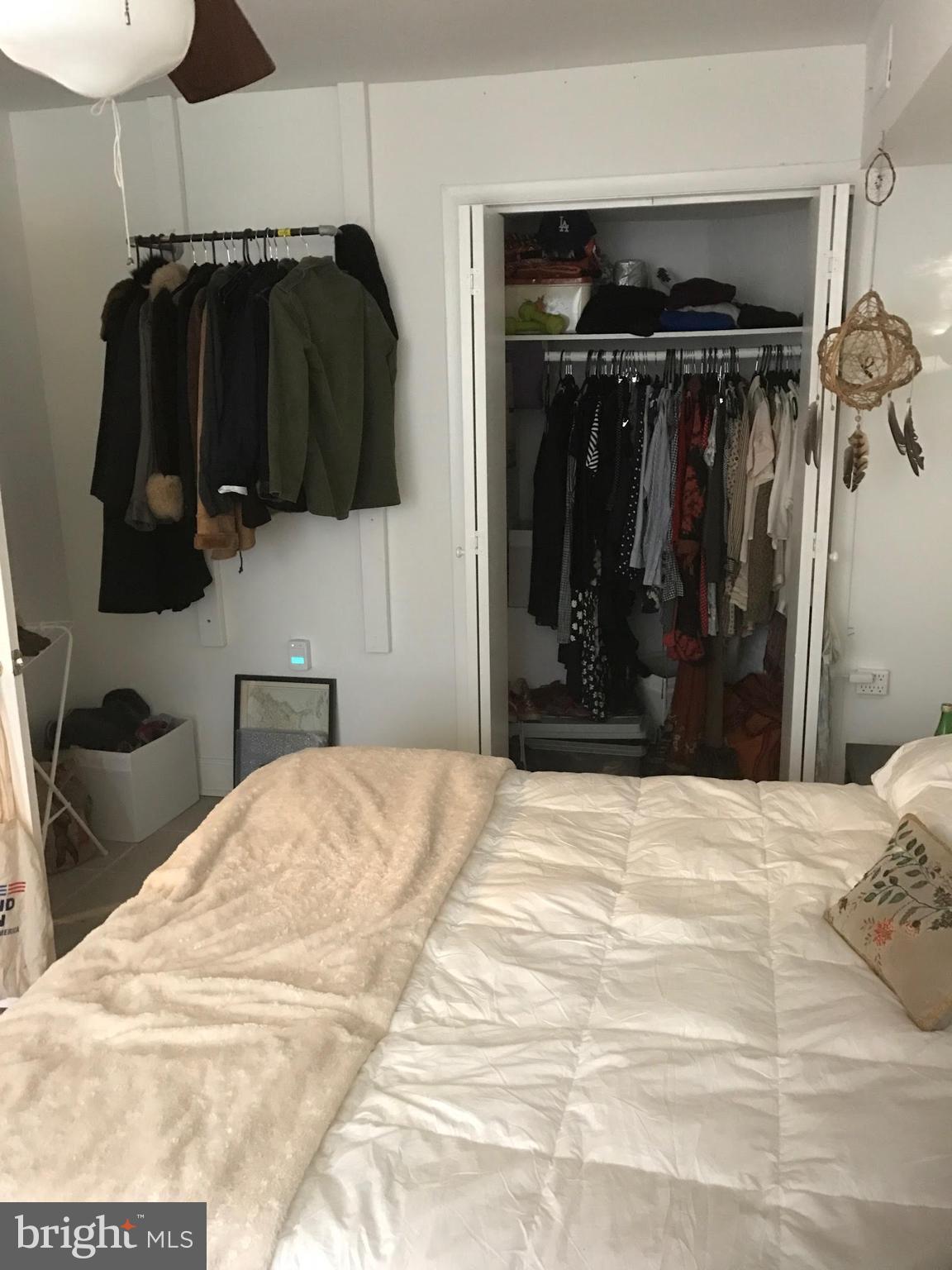 11 N Street Northwest Washington, DC 20001 - Photo 13 of 17 a bedroom with a bed and a closet