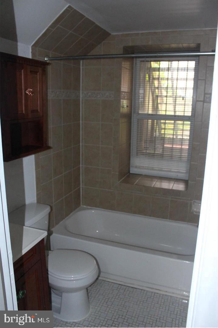 11 N Street Northwest Washington, DC 20001 - Photo 15 of 17 a bathroom with a shower and a toilet