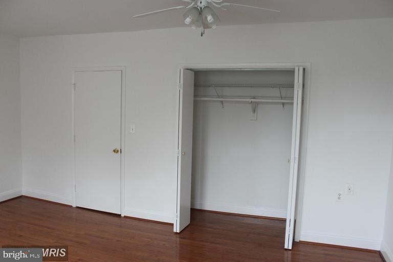 11 N Street Northwest Washington, DC 20001 - Photo 8 of 17 a view of an empty room with wooden floor