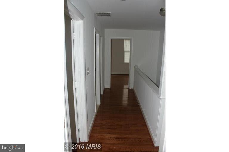11 N Street Northwest Washington, DC 20001 - Photo 10 of 17 a view of a hallway with wooden floor