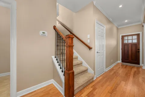 a view of a hallway with staircase