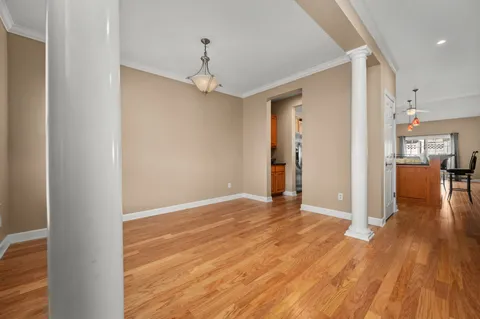 a view of a livingroom with wooden floor