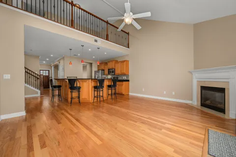 a view of a kitchen with furniture and a fireplace
