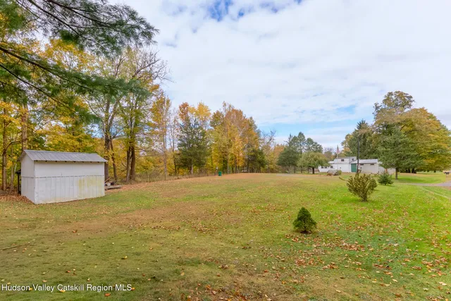 a view of outdoor space and yard