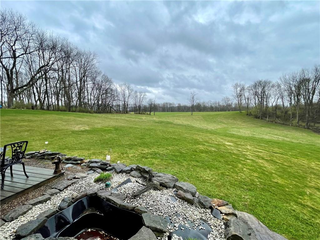 112 Mechling Road Kittanning, PA 16201 - Photo 21 of 25 a view of a golf course with a lake