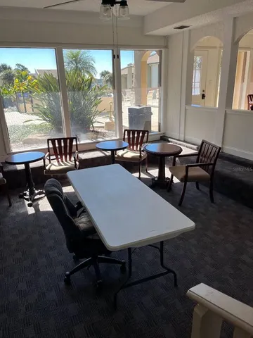 a view of balcony with furniture