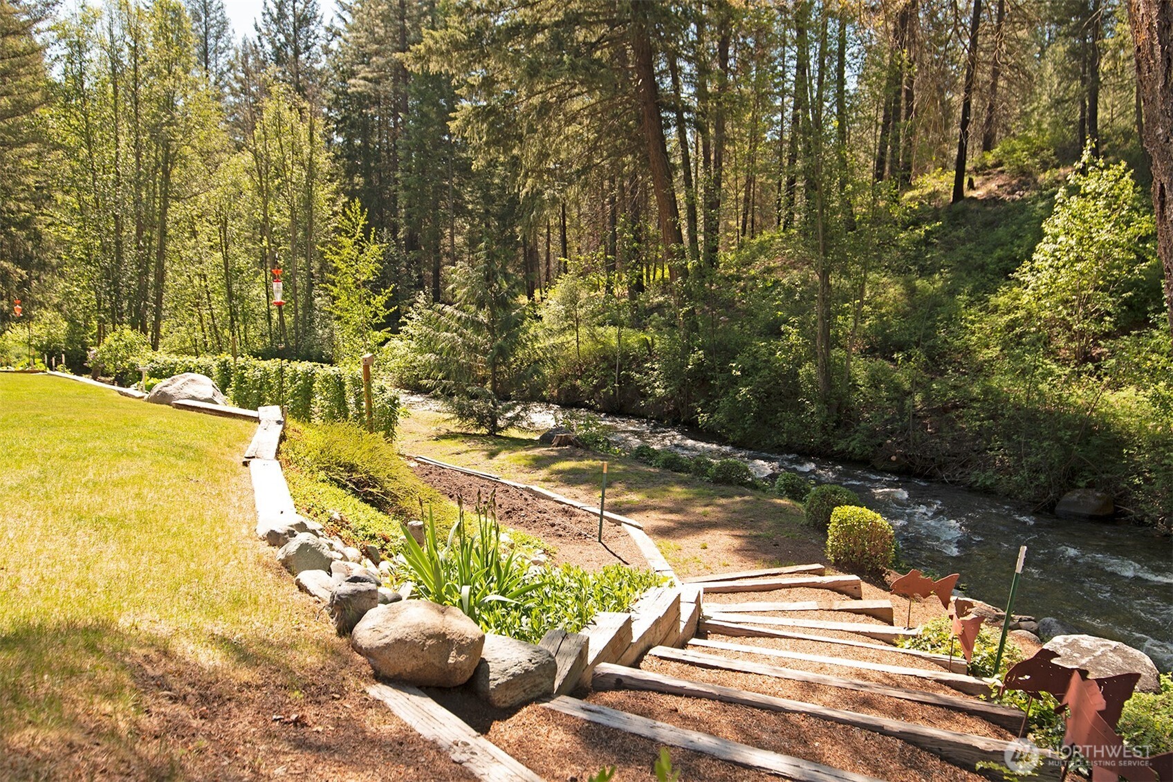 201 Libby Creek Road Carlton, WA 98814 - Photo 32 of 37 a view of a swimming pool with a patio