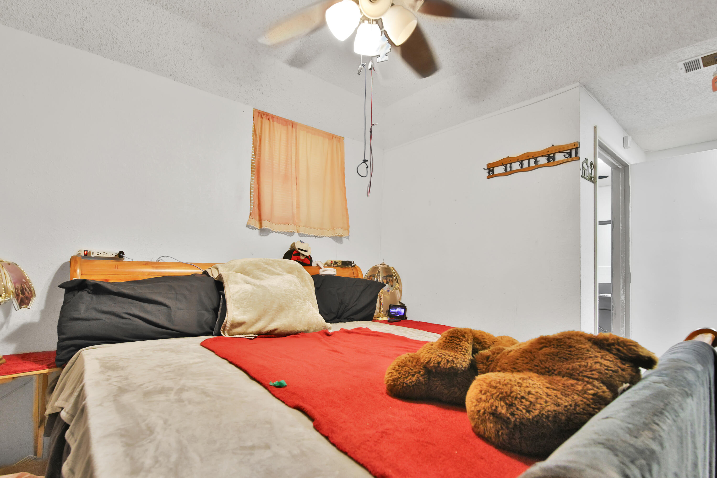 1211 140th Street Lubbock, TX 79423 - Photo 12 of 48 a bedroom with bed and window