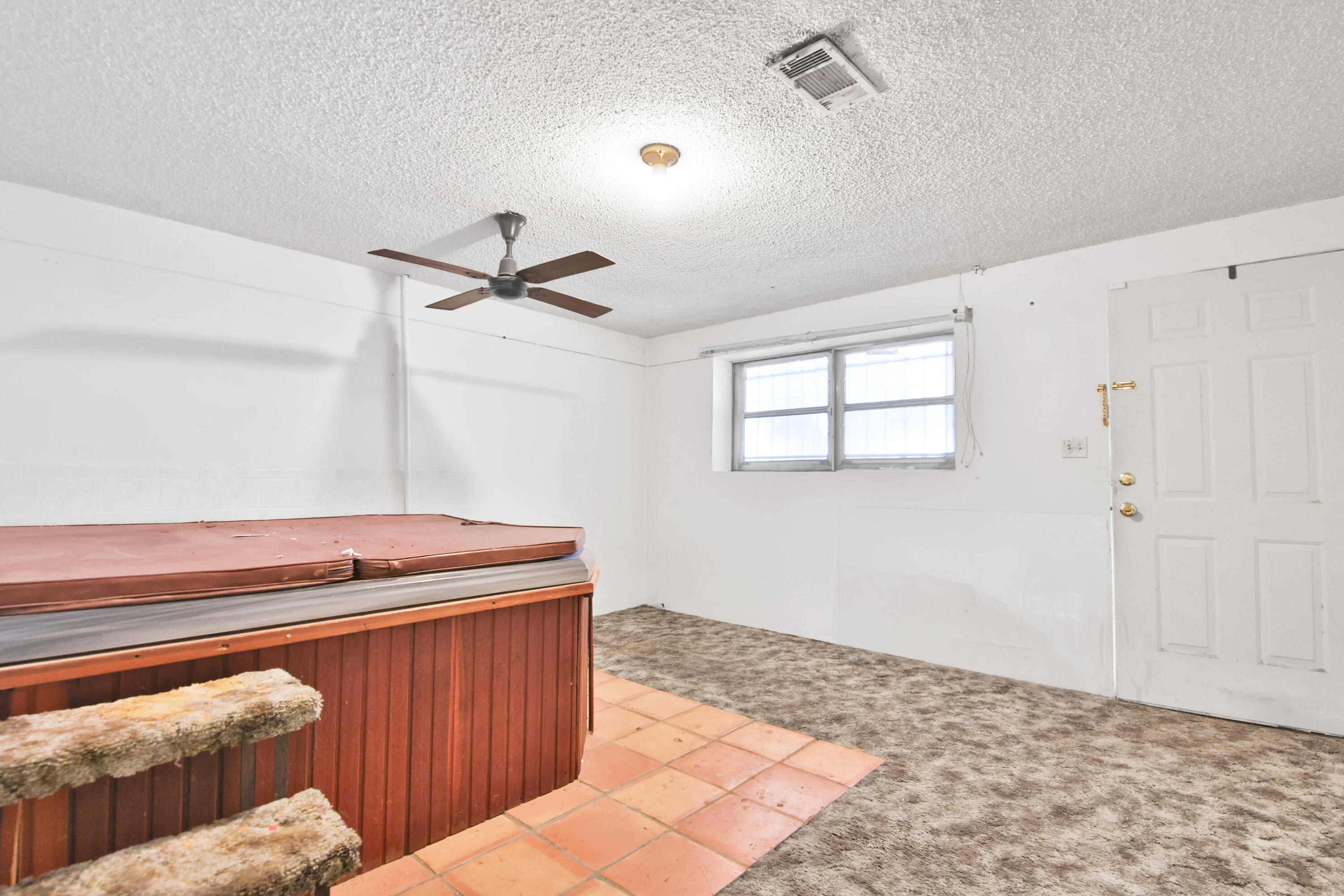 1211 140th Street Lubbock, TX 79423 - Photo 16 of 48 a room with wooden floor and windows