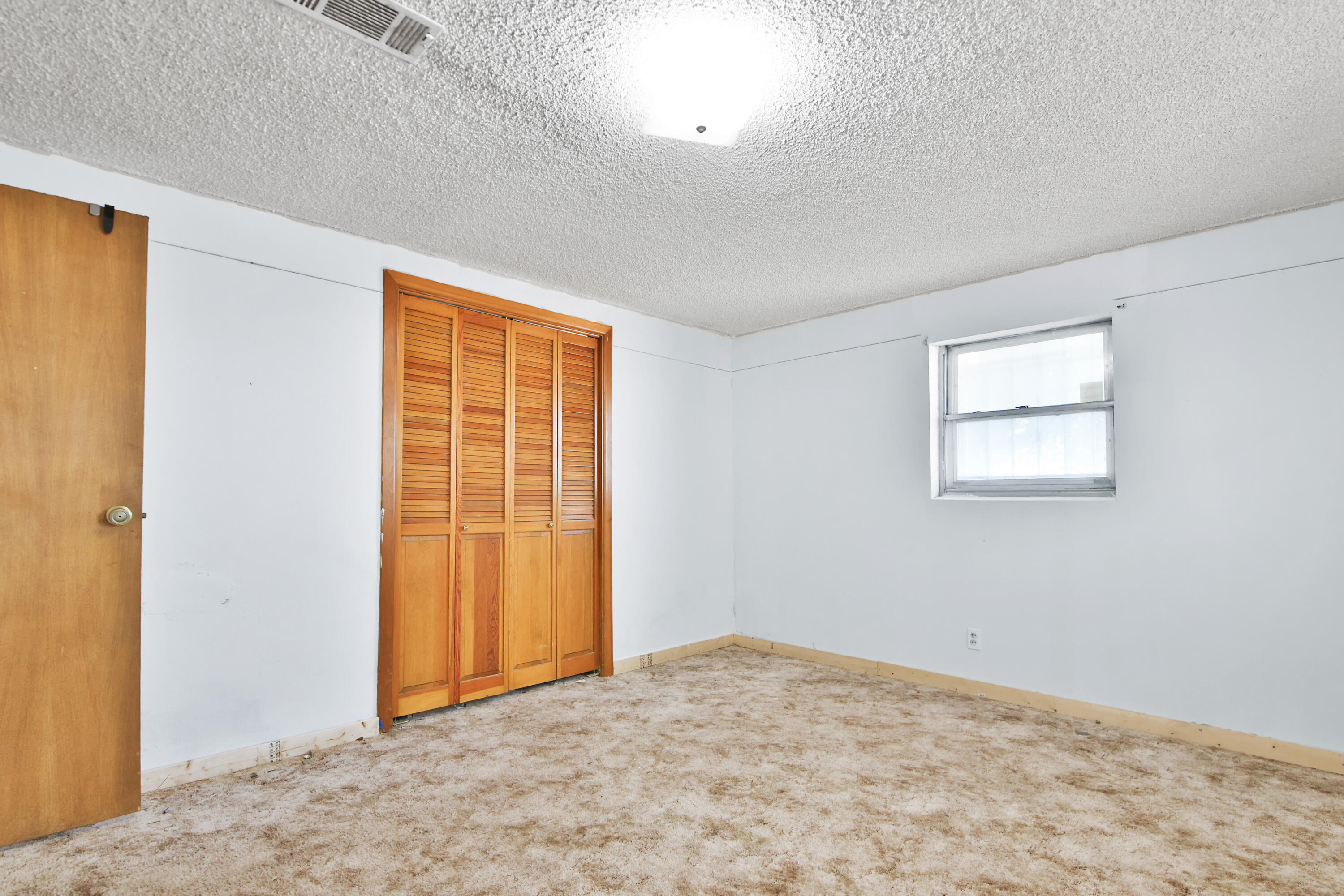 1211 140th Street Lubbock, TX 79423 - Photo 30 of 48 an empty room with windows