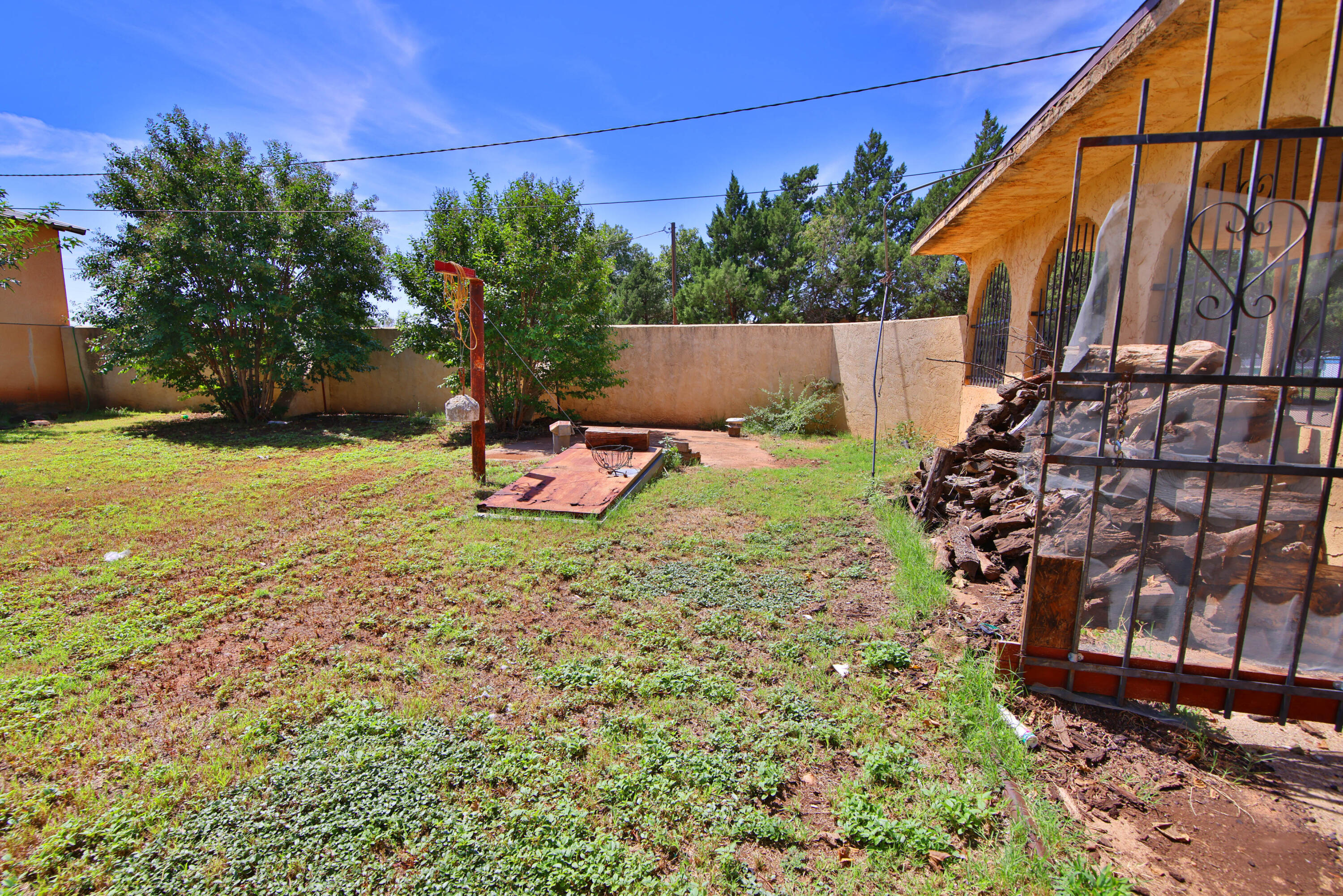 1211 140th Street Lubbock, TX 79423 - Photo 37 of 48 a backyard of a house with lots of green space