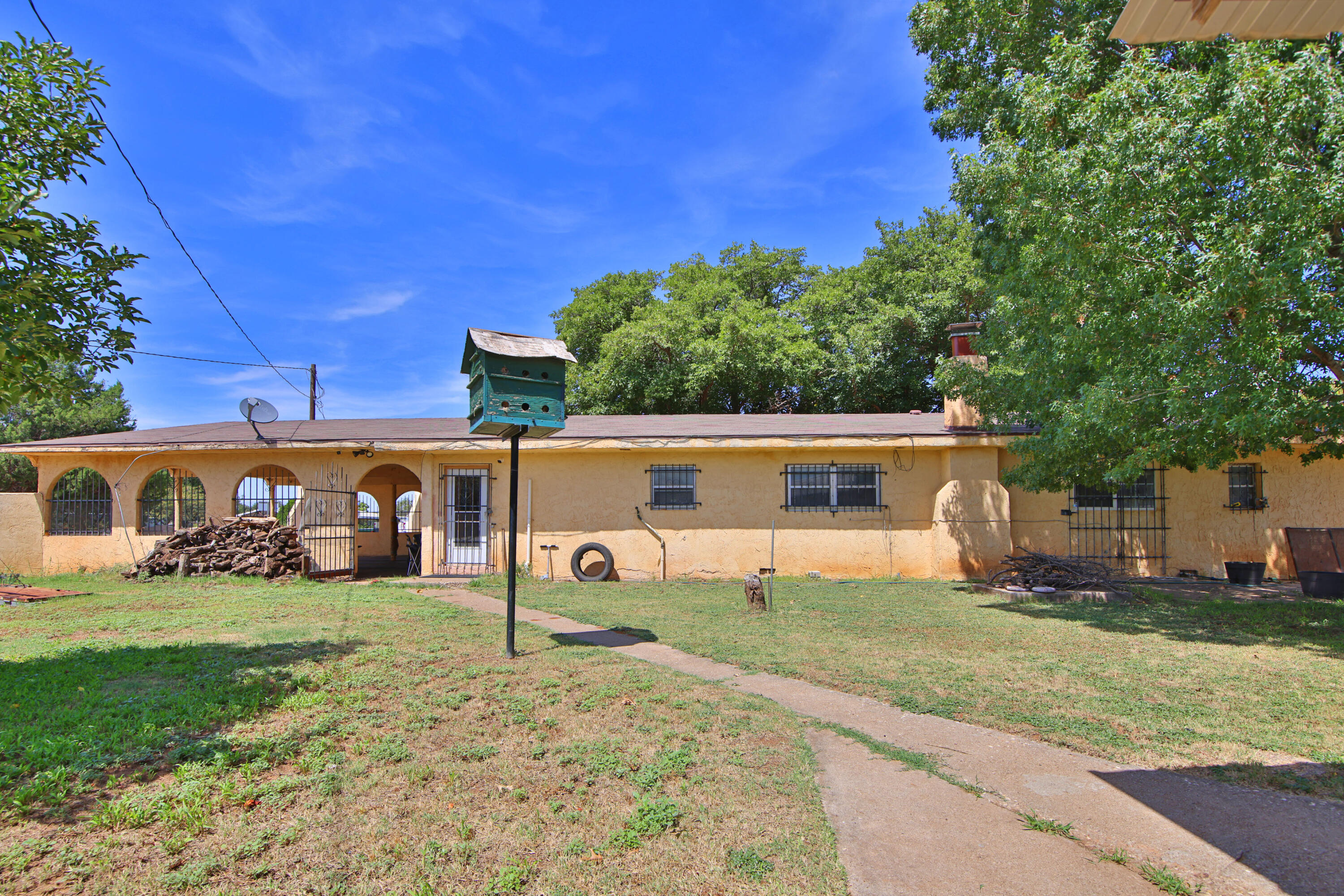 1211 140th Street Lubbock, TX 79423 - Photo 39 of 48 front view of house with a yard