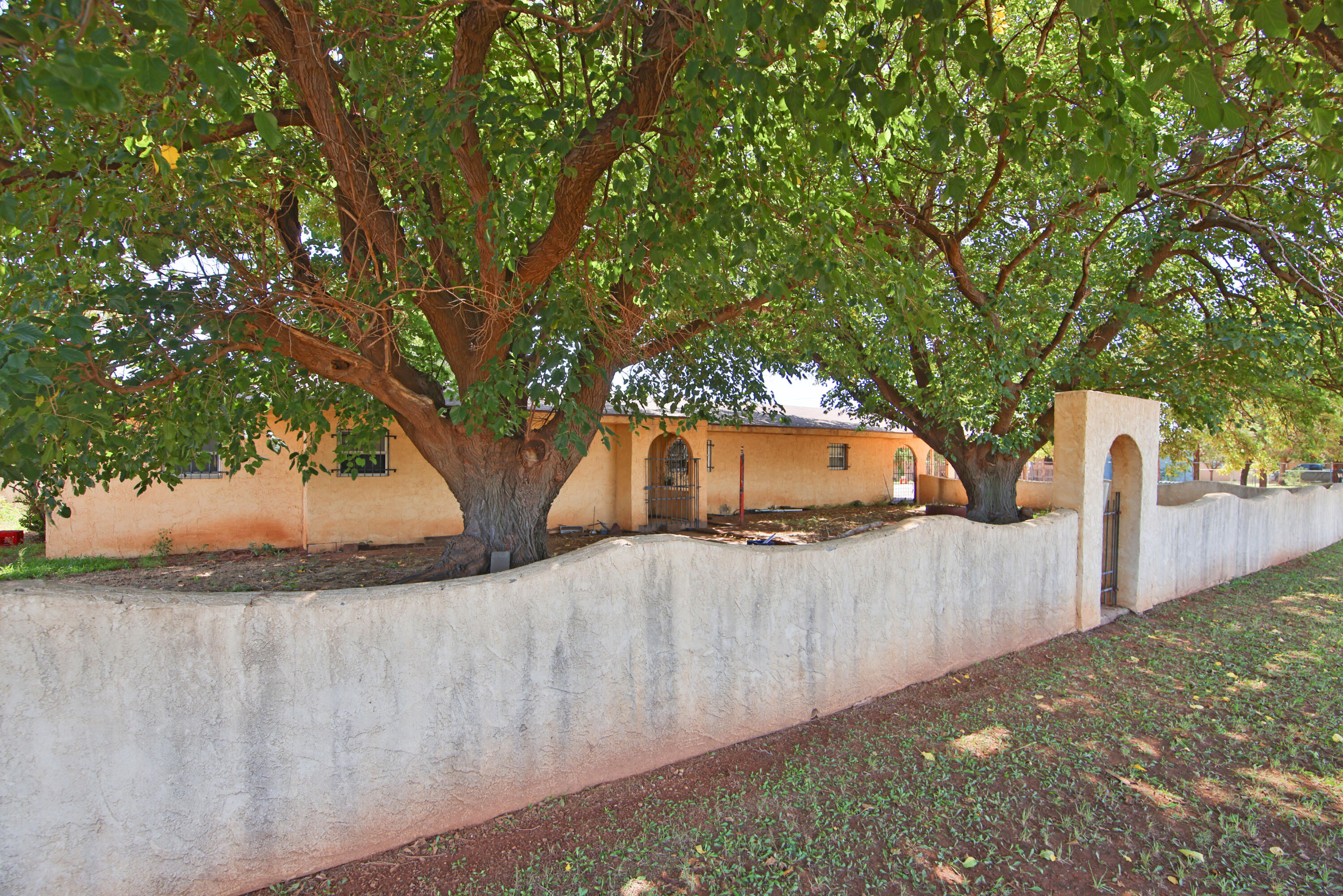 1211 140th Street Lubbock, TX 79423 - Photo 4 of 48 a view of a wooden fence