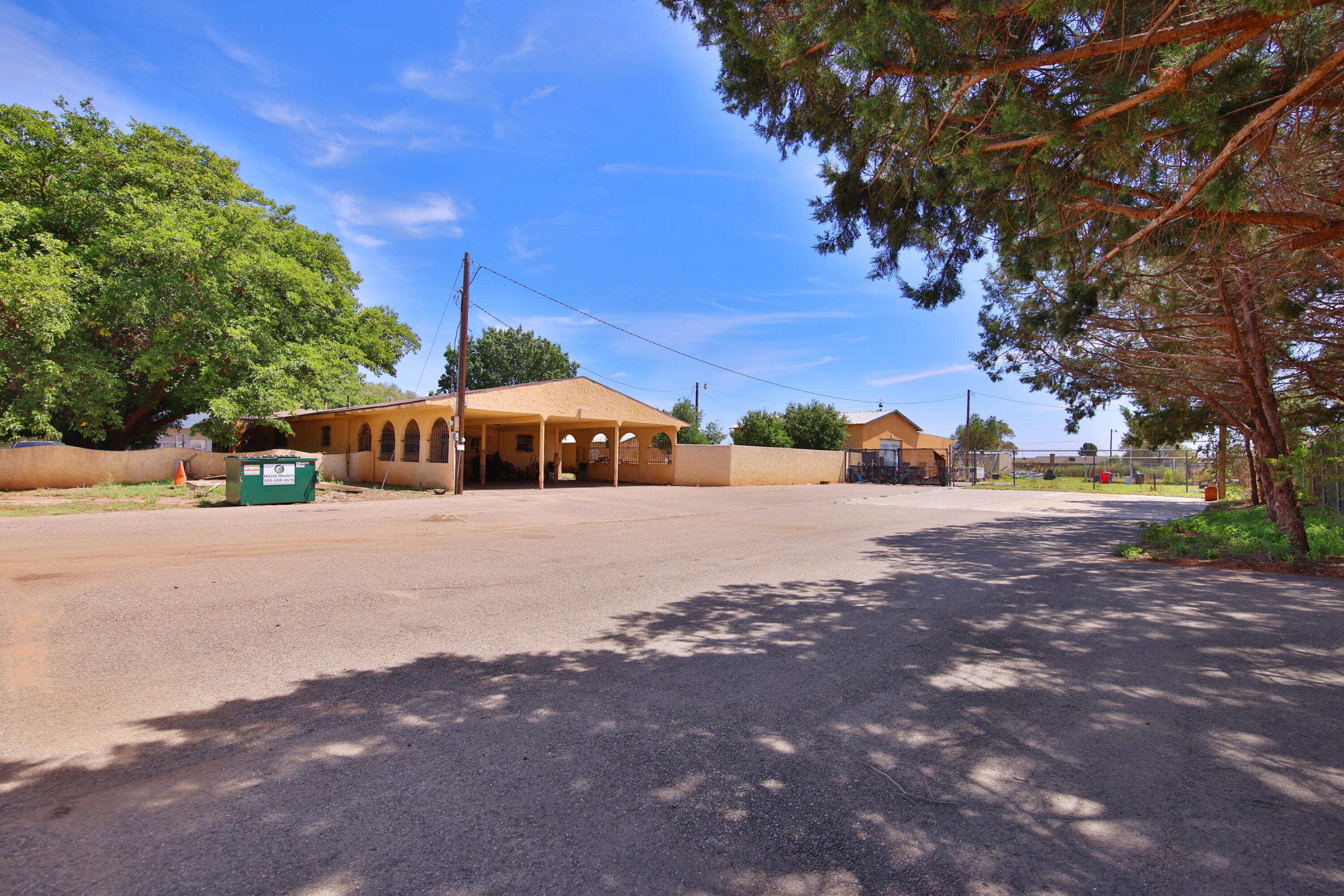1211 140th Street Lubbock, TX 79423 - Photo 47 of 48 a street view with large trees