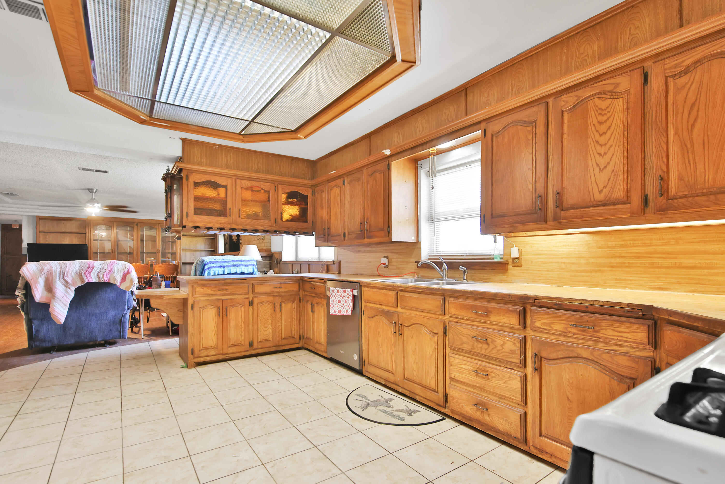 1211 140th Street Lubbock, TX 79423 - Photo 7 of 48 a kitchen with stainless steel appliances granite countertop a sink and cabinets