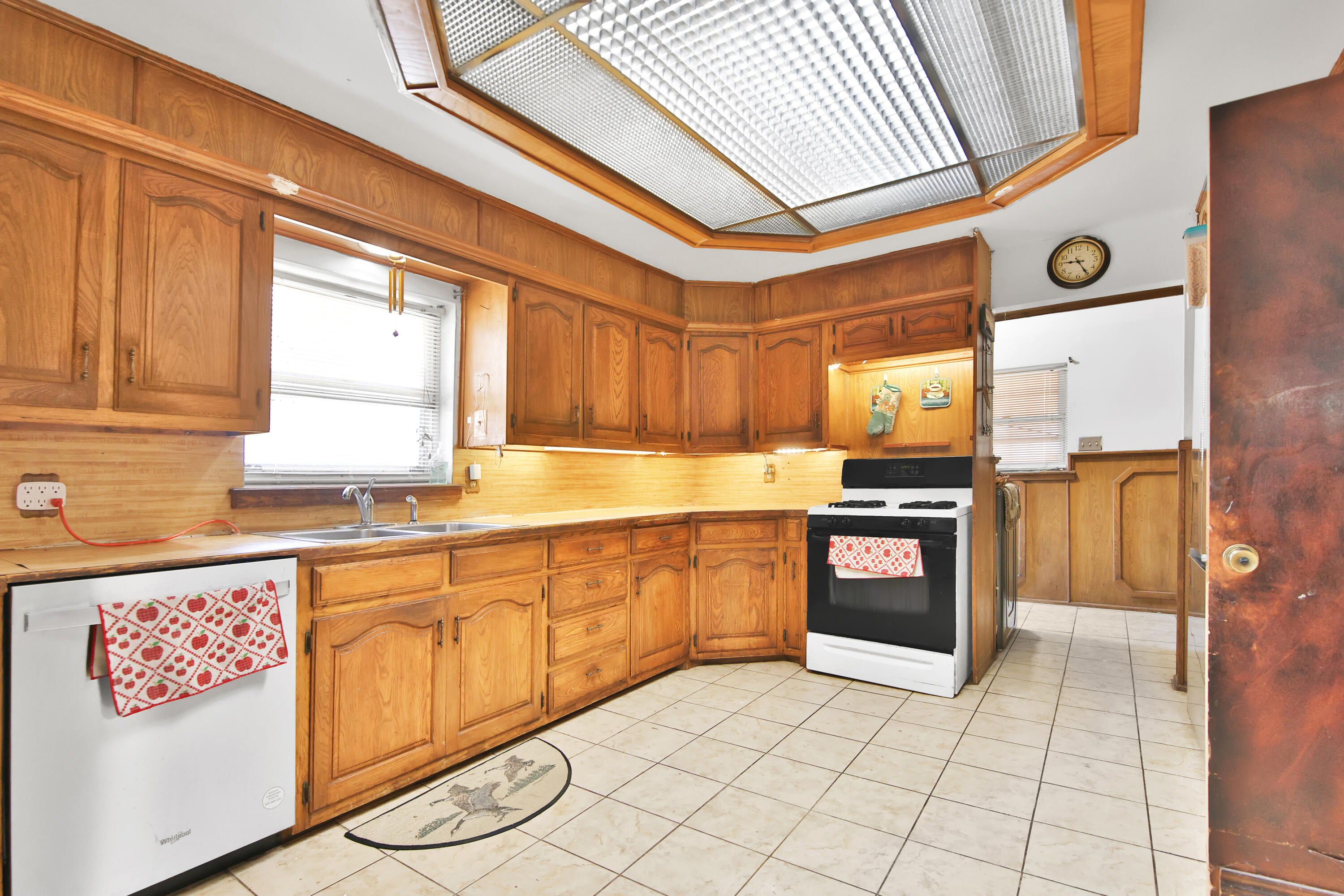 1211 140th Street Lubbock, TX 79423 - Photo 8 of 48 a kitchen with stainless steel appliances granite countertop a refrigerator and a stove