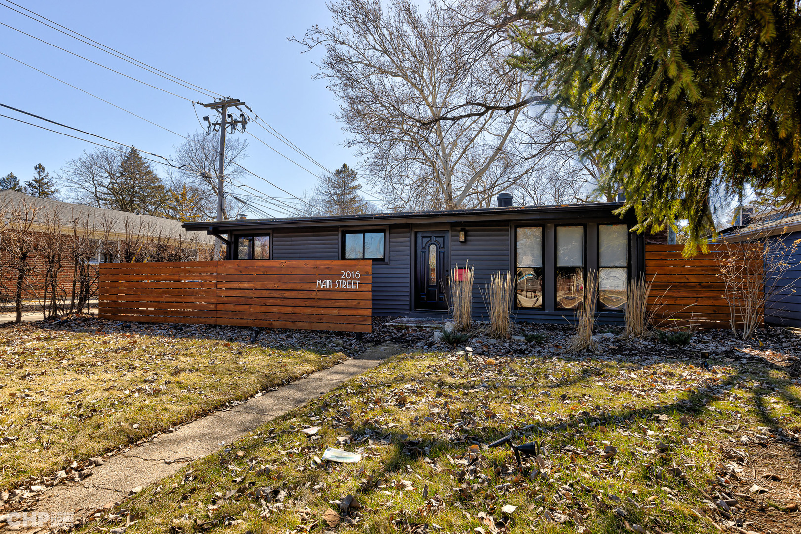 2016 Main Street Evanston, IL 60202 - Photo 8 of 8 a backyard of a house with barbeque oven table and chairs