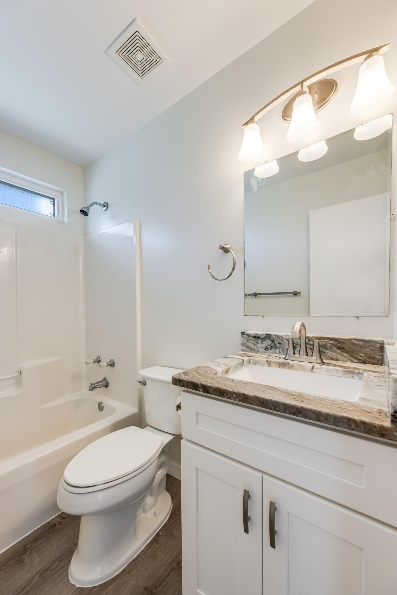 475 Sandy Ridge Circle Mary Esther, FL 32569 - Photo 11 of 26 a bathroom with a granite countertop toilet sink and mirror