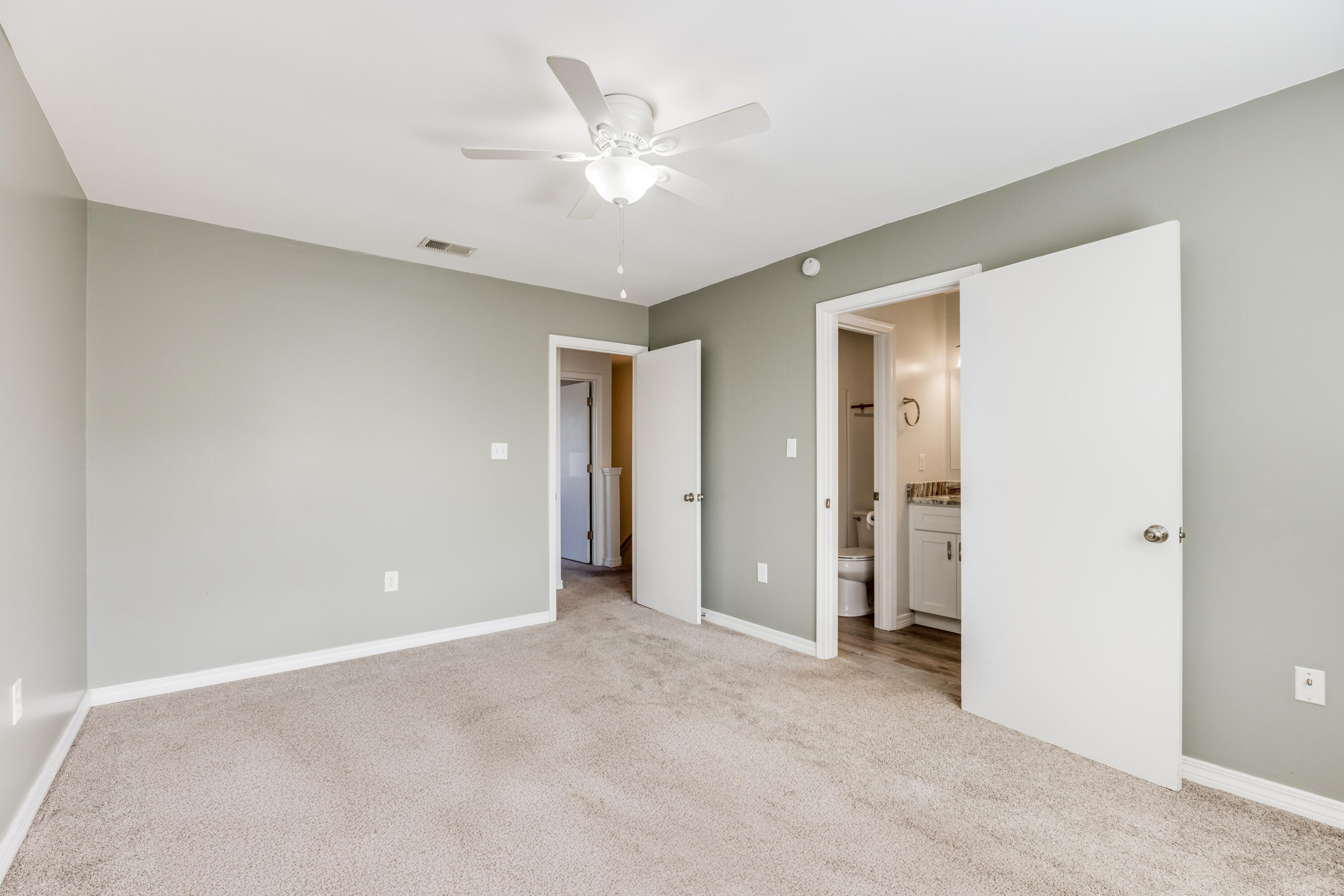 475 Sandy Ridge Circle Mary Esther, FL 32569 - Photo 14 of 26 a view of an empty room with a ceiling fan