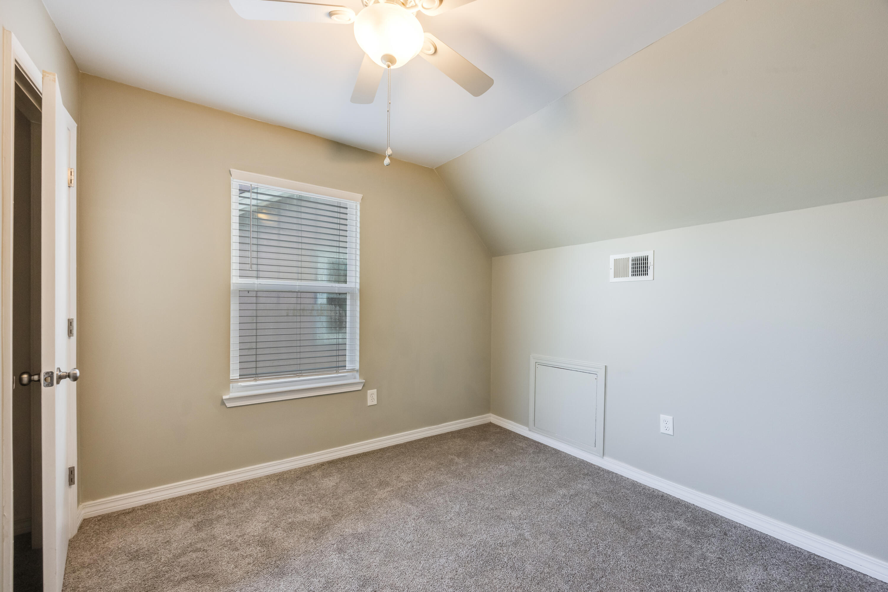 475 Sandy Ridge Circle Mary Esther, FL 32569 - Photo 17 of 26 an empty room with windows and fan