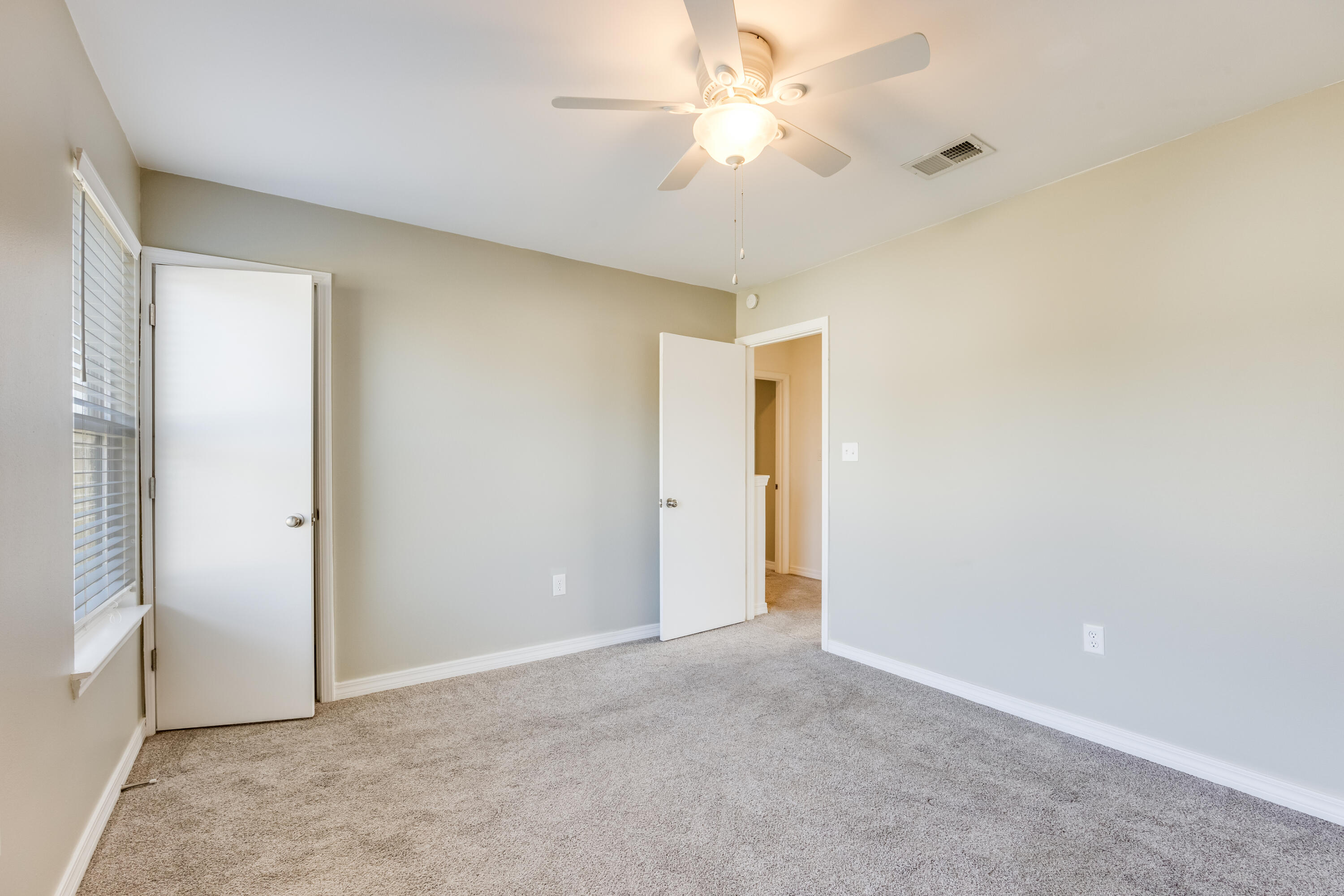 475 Sandy Ridge Circle Mary Esther, FL 32569 - Photo 20 of 26 a view of an empty room and a ceiling fan
