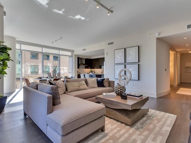 7775 Firefall Way, Unit 3208 Dallas, TX 75230 - Photo 14 of 23 a living room with fireplace furniture and a wooden floor