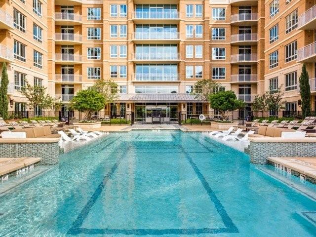 7775 Firefall Way, Unit 3208 Dallas, TX 75230 - Photo 16 of 23 a view of a building with garden and sitting area