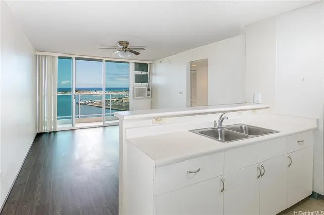 a bathroom with a sink and a window