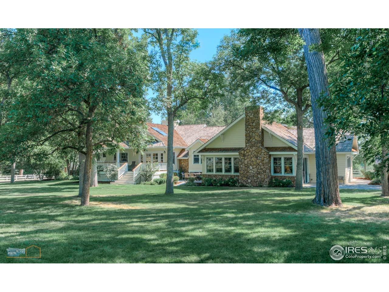 8522 Valmont Road Boulder, CO 80301 - Photo 1 of 49 a front view of a house with a yard