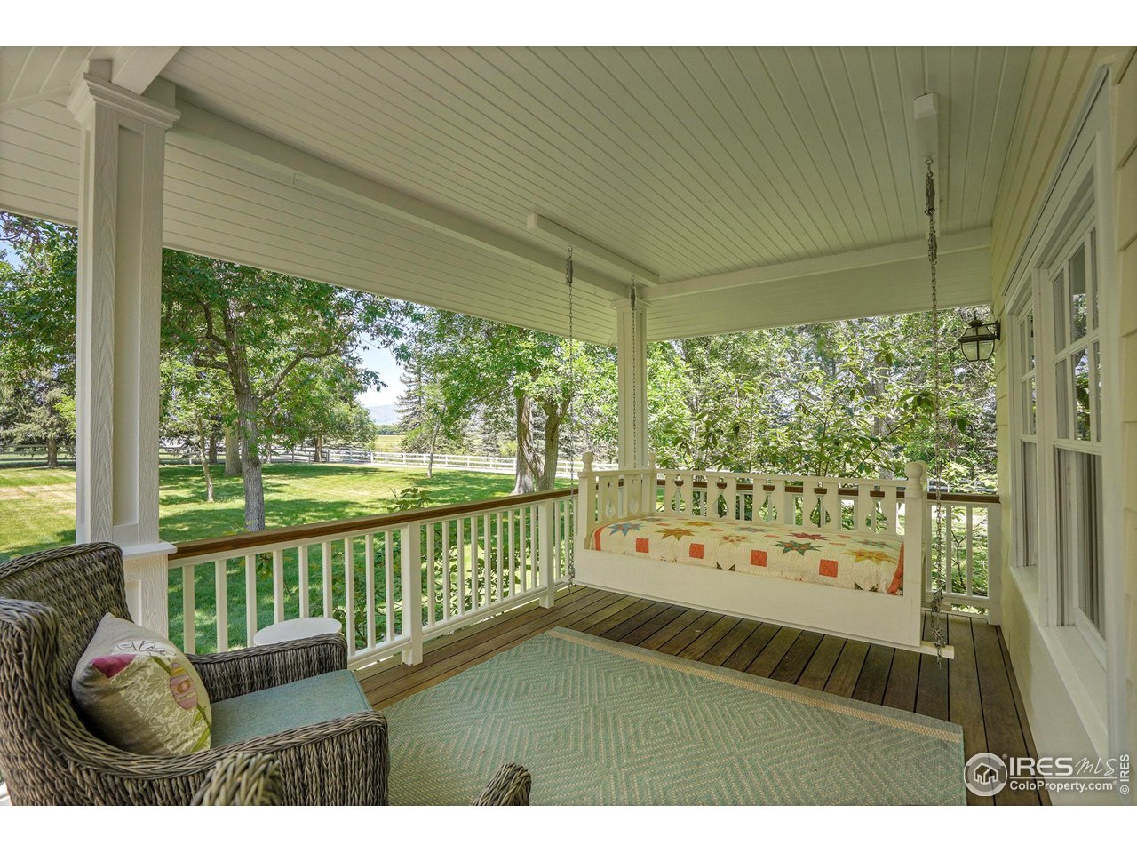 8522 Valmont Road Boulder, CO 80301 - Photo 11 of 49 a view of a porch with furniture and garden
