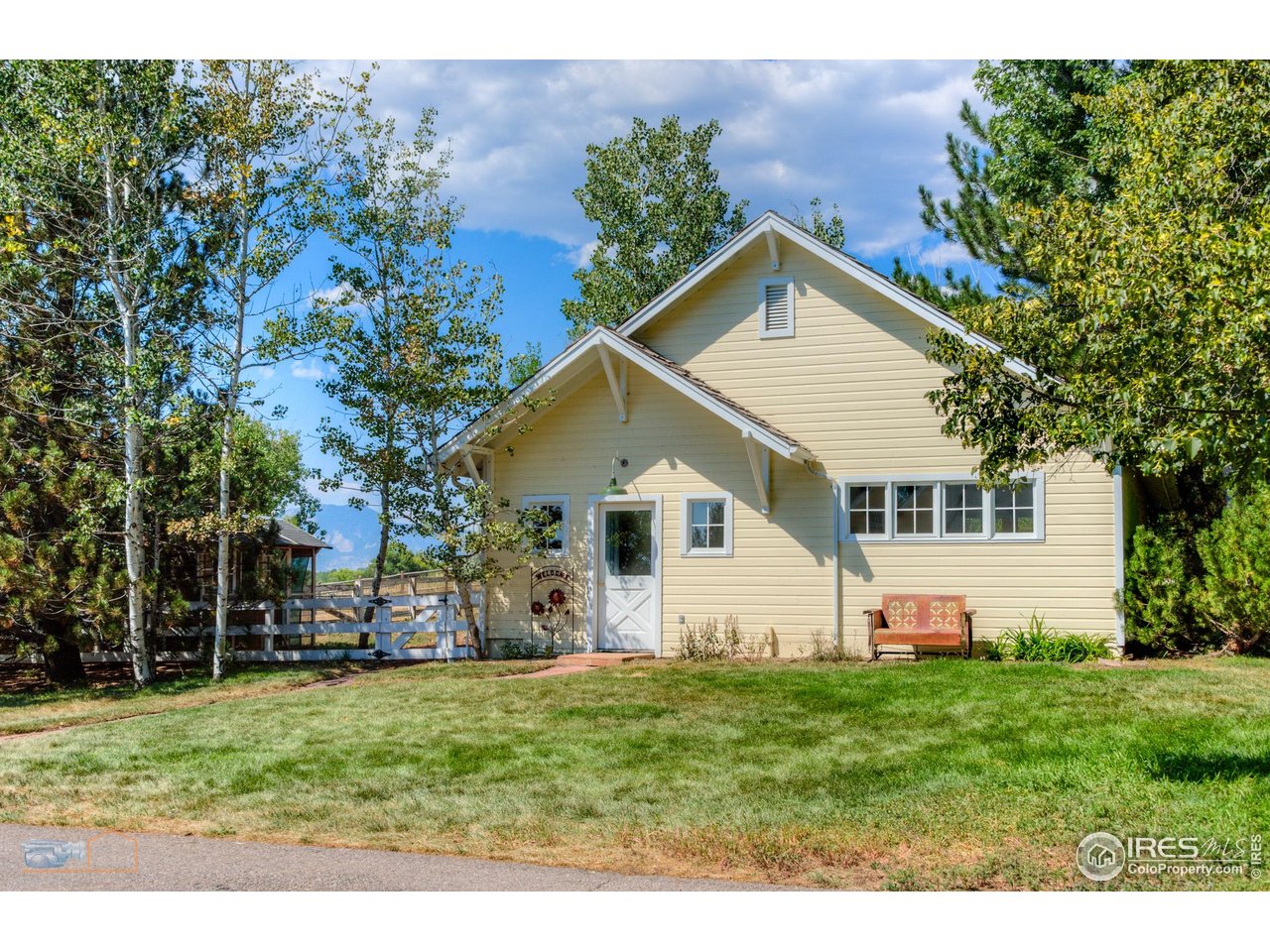 8522 Valmont Road Boulder, CO 80301 - Photo 26 of 49 a view of a house with a yard