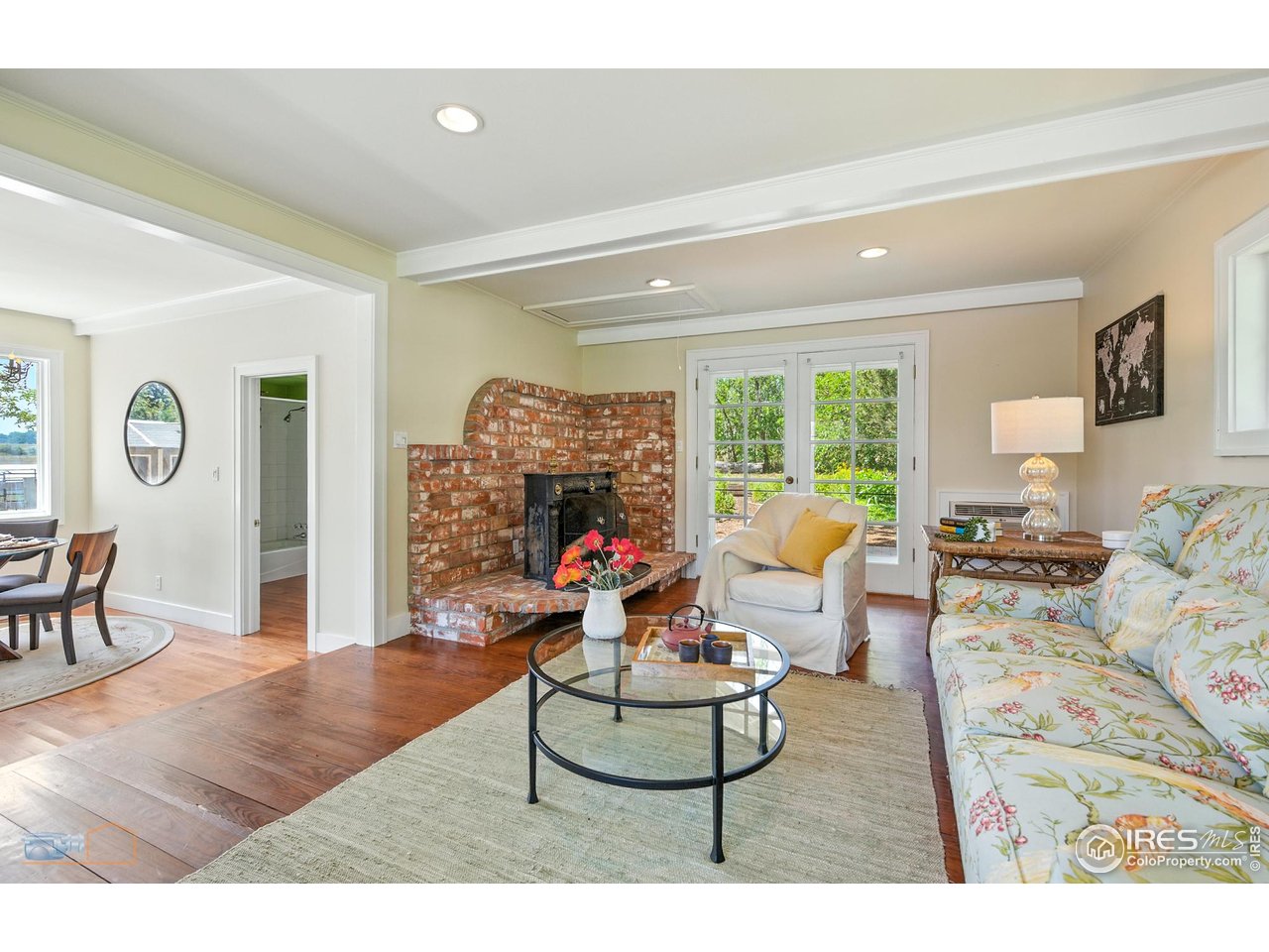 8522 Valmont Road Boulder, CO 80301 - Photo 28 of 49 a living room with furniture and a fireplace
