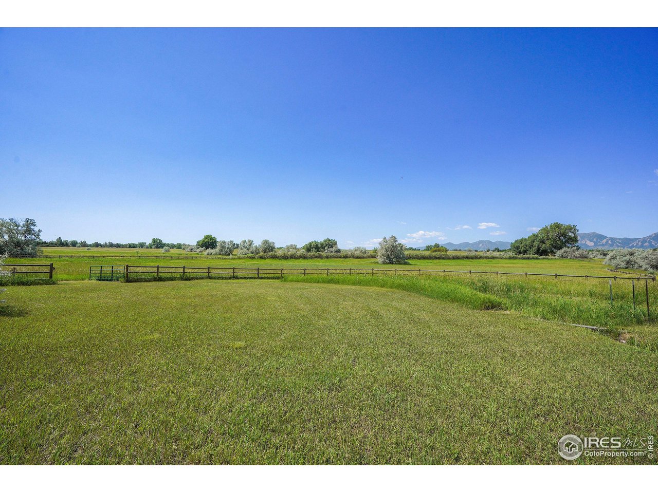 8522 Valmont Road Boulder, CO 80301 - Photo 43 of 49 a view of a green field with clear sky