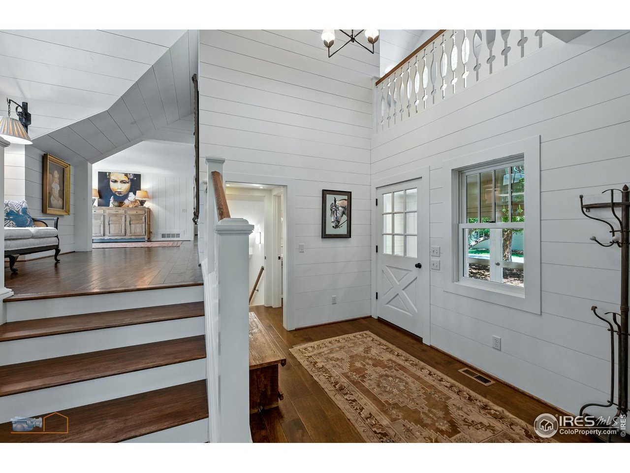8522 Valmont Road Boulder, CO 80301 - Photo 5 of 49 a view of entryway and hall with wooden floor