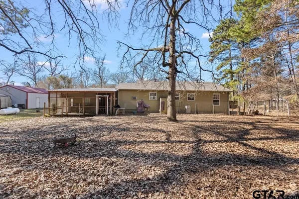 an aerial view of residential house with outdoor space