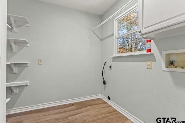 a view of small space with racks on the wall