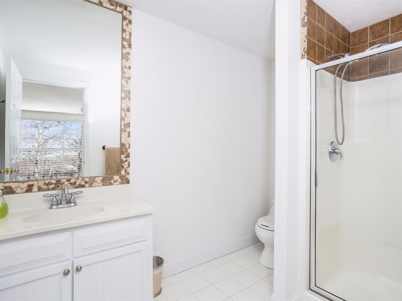108 Fells Pond Road Mashpee, MA 02649 - Photo 17 of 35 a bathroom with a sink a toilet and shower