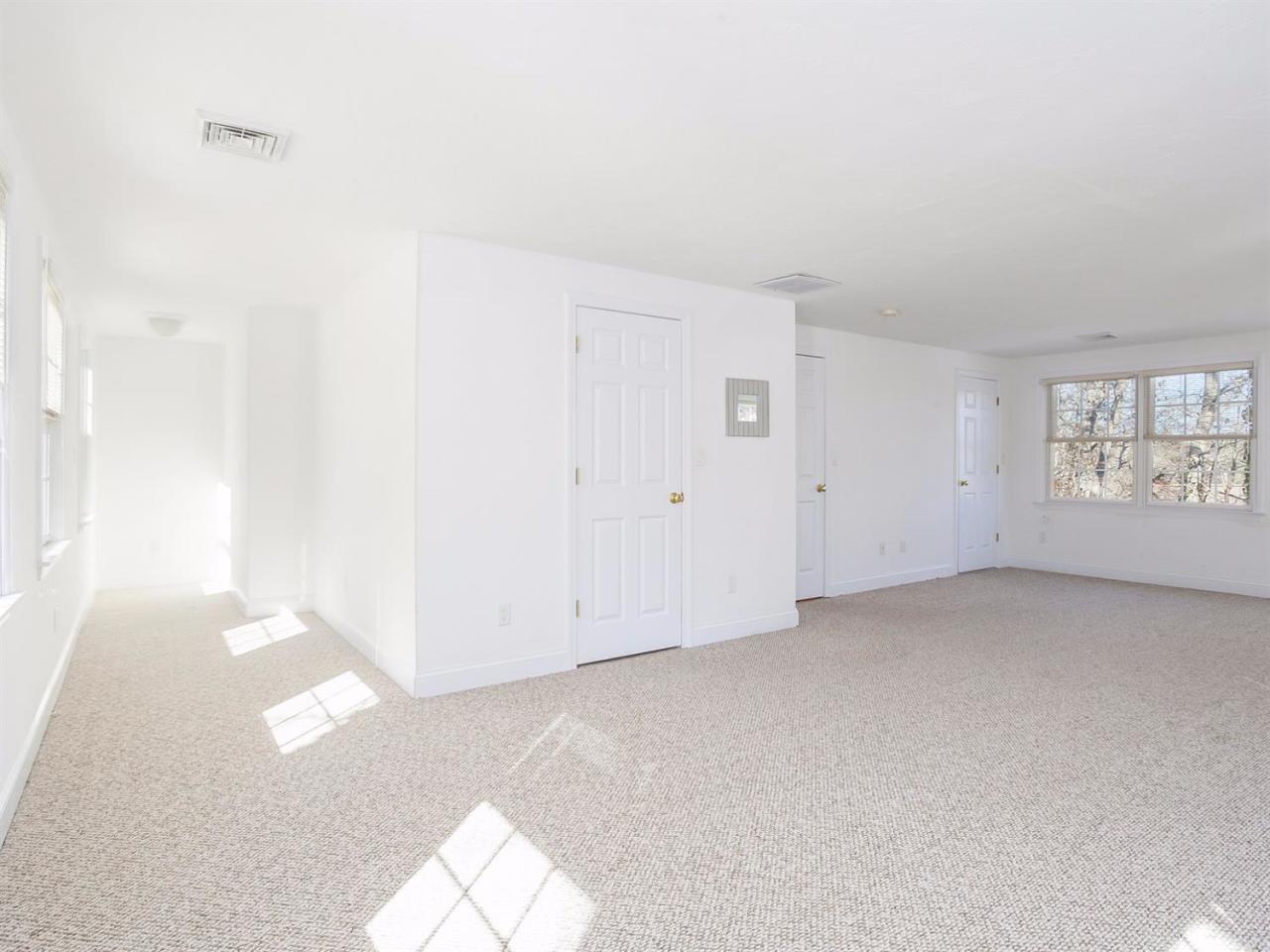 108 Fells Pond Road Mashpee, MA 02649 - Photo 20 of 35 an empty room with windows