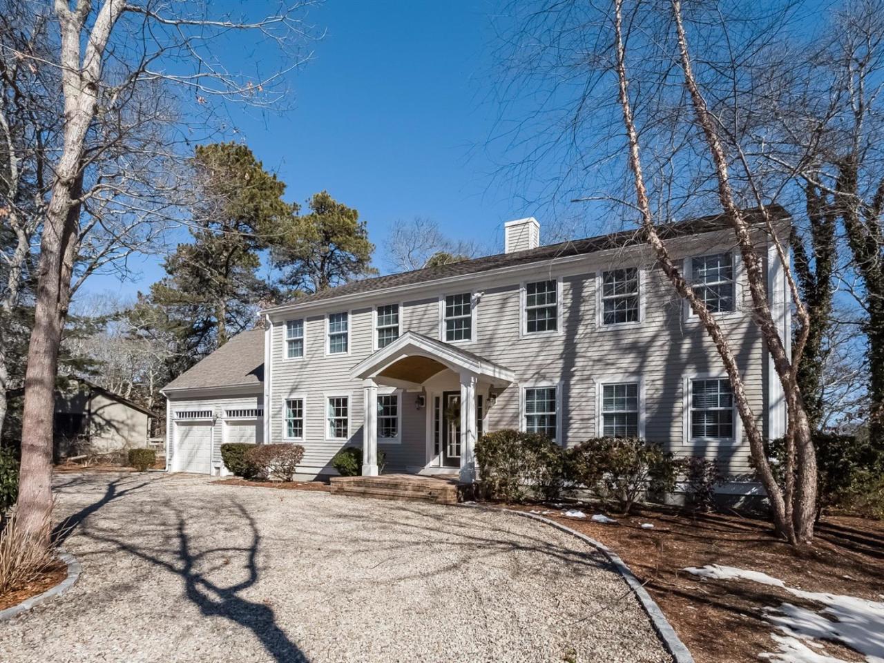 108 Fells Pond Road Mashpee, MA 02649 - Photo 3 of 35 a front view of a house with yard